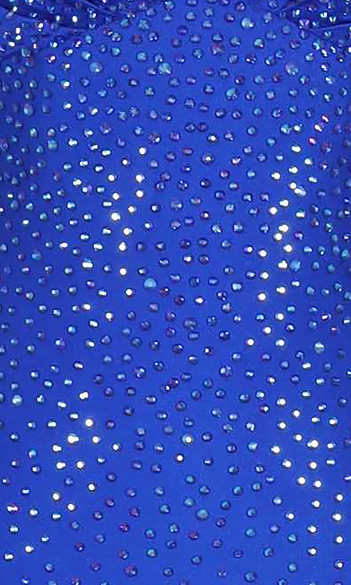 Close-up of the Empire-Waist Mermaid Prom Dress: PromGirl Exclusive, showing blue fabric adorned with evenly spaced, reflective rhinestones for a sparkling effect.